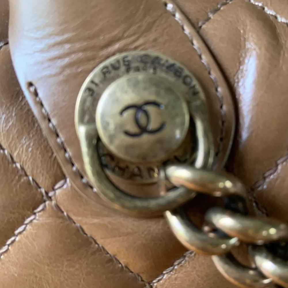 Classic brown lamb‎ skin Chanel handbag with shoulder strap